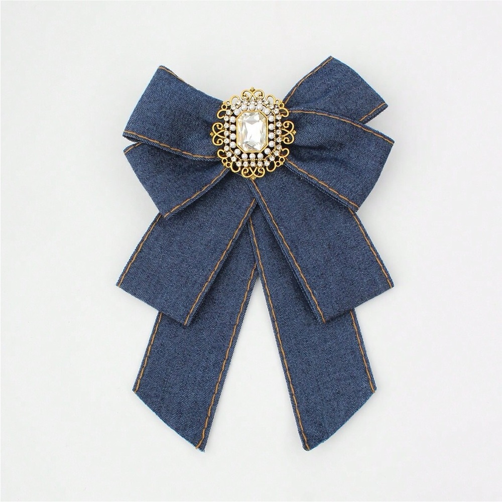 Elegant Blue Bow Brooch with Gold Accent